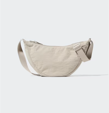 Uniqlo - سترة ماء للسيدات